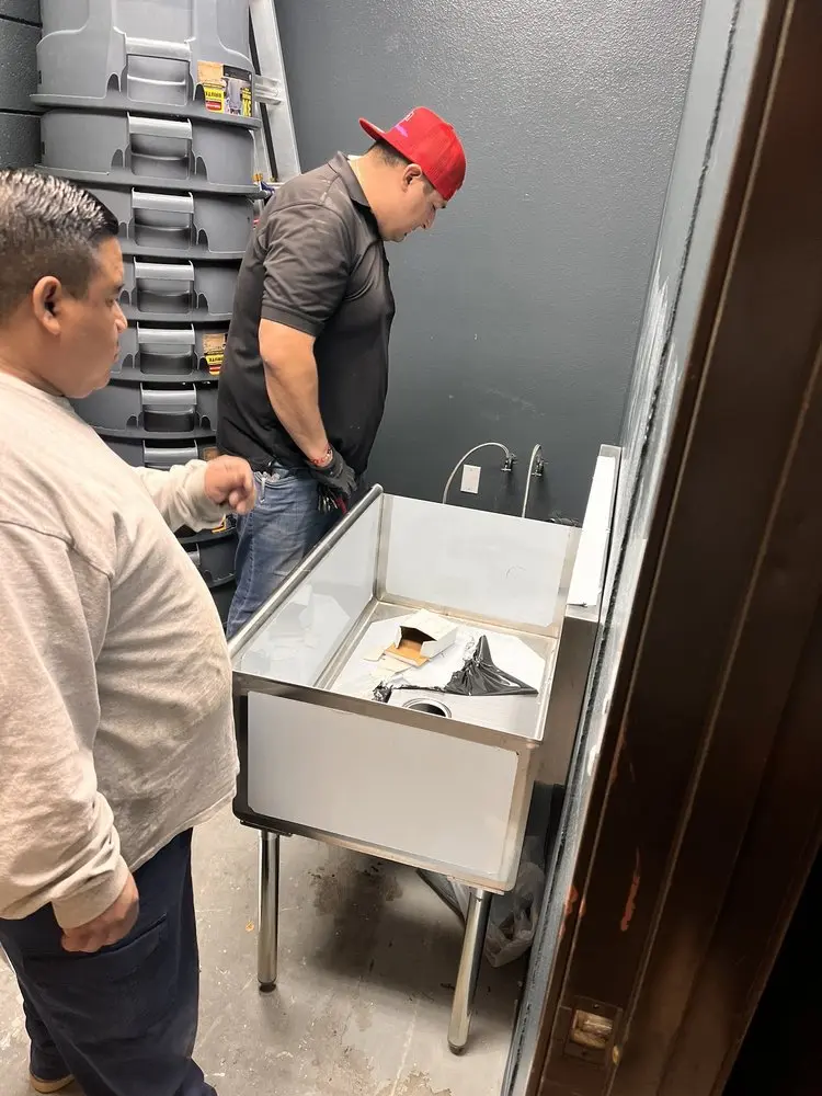 Commercial plumbing and sink installation in West Berlin